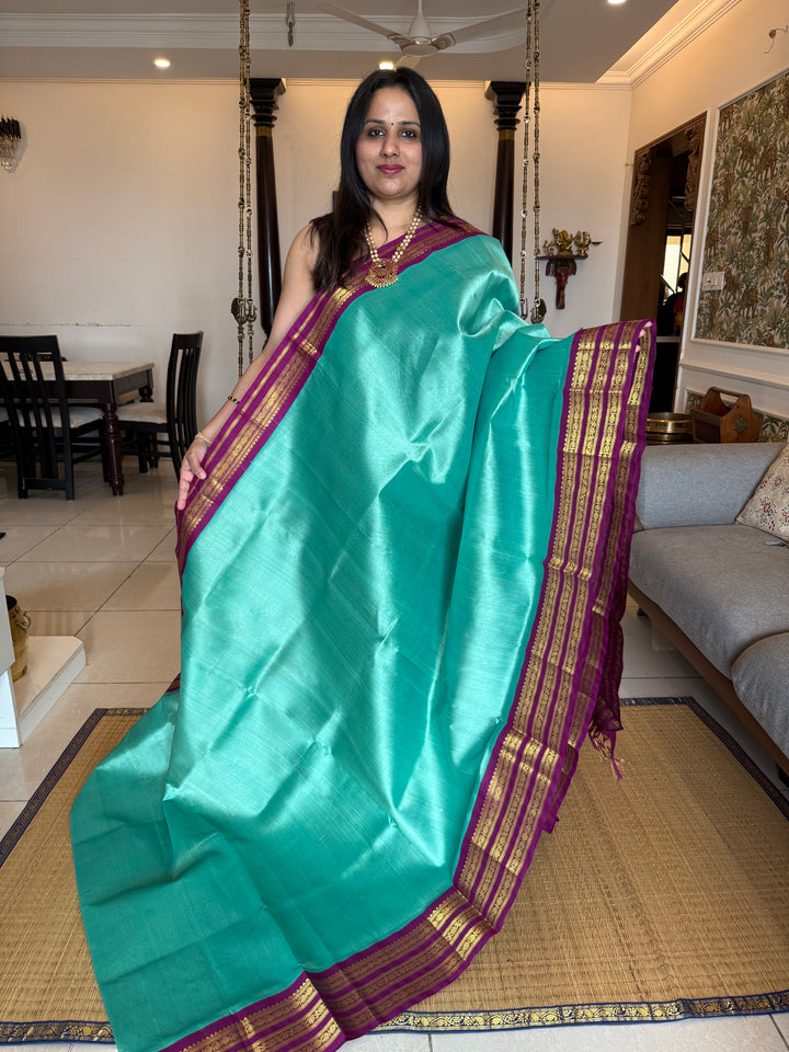 Teal with Purple one side big , Kanchi borders  and rich Pallu  Korvai Silk Cotton Saree