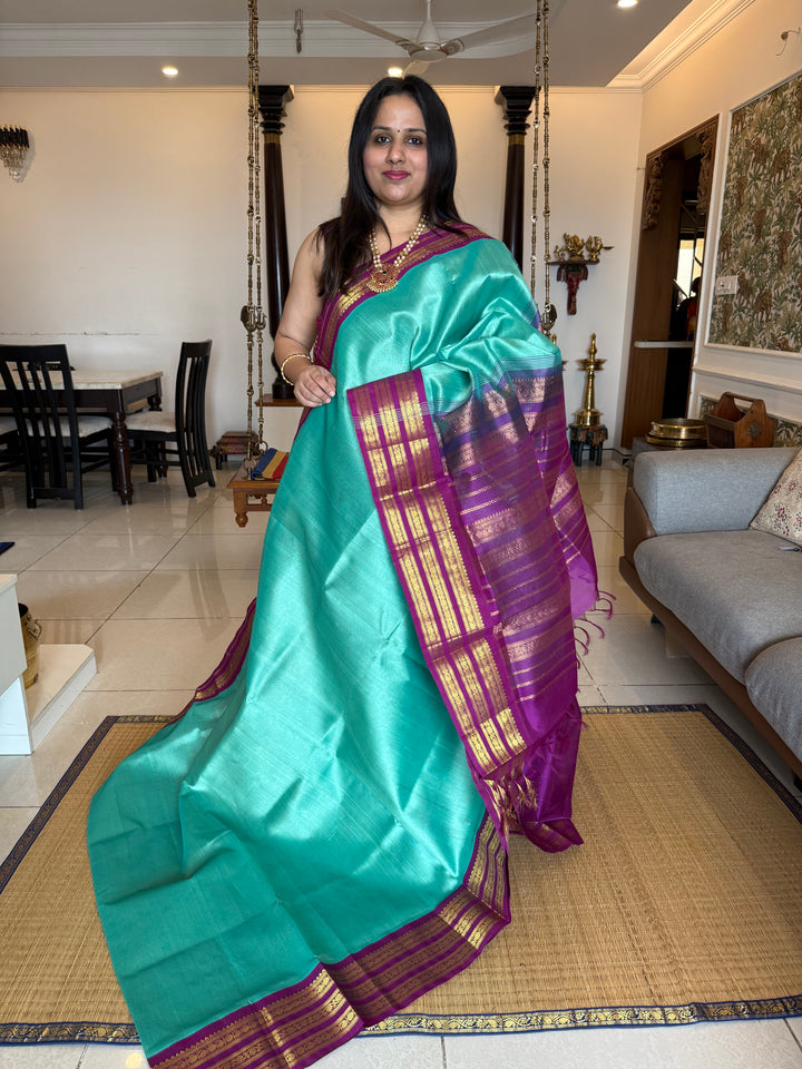 Teal with Purple one side big , Kanchi borders  and rich Pallu  Korvai Silk Cotton Saree