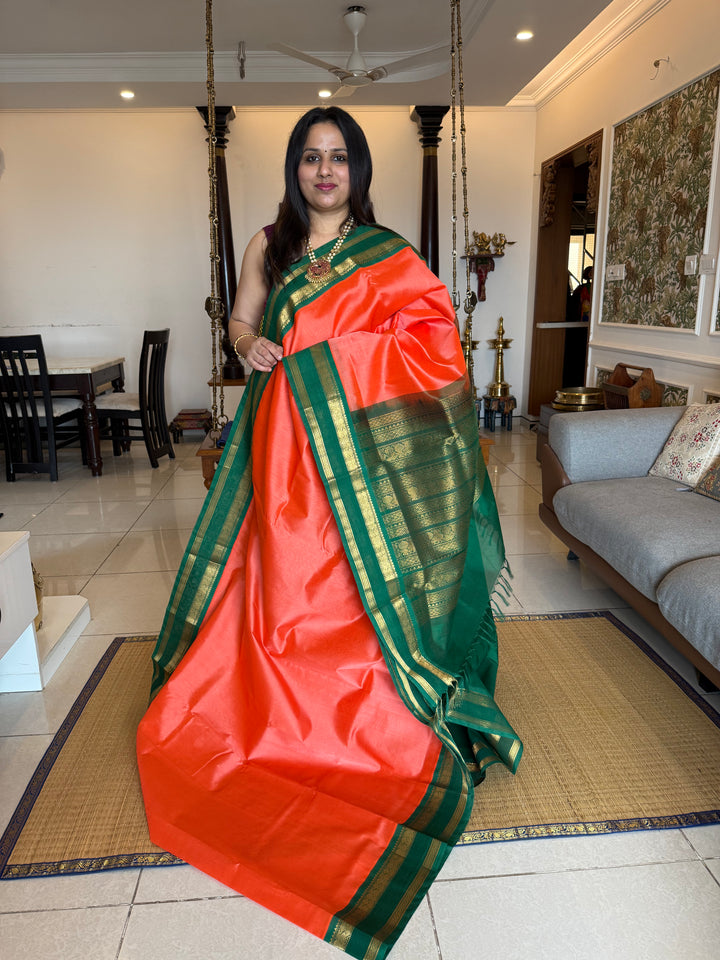 Kanakambaram with Green , traditional Kanchi borders  and rich Pallu  Korvai Silk Cotton Saree