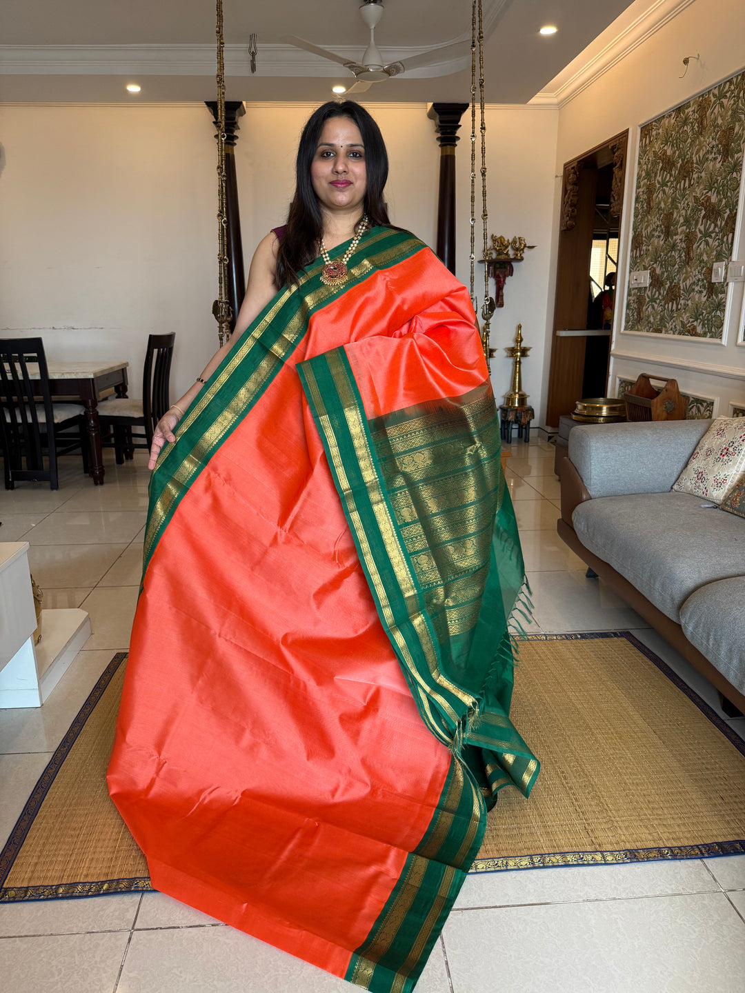 Kanakambaram with Green , traditional Kanchi borders  and rich Pallu  Korvai Silk Cotton Saree