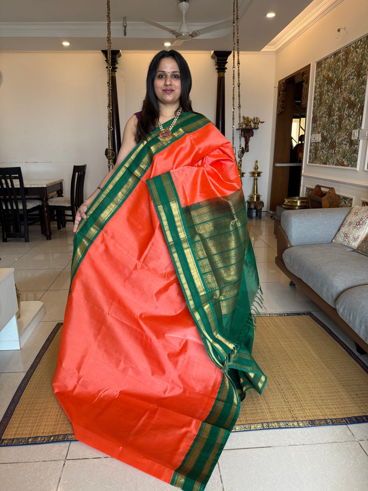 Kanakambaram with Green , traditional Kanchi borders  and rich Pallu  Korvai Silk Cotton Saree
