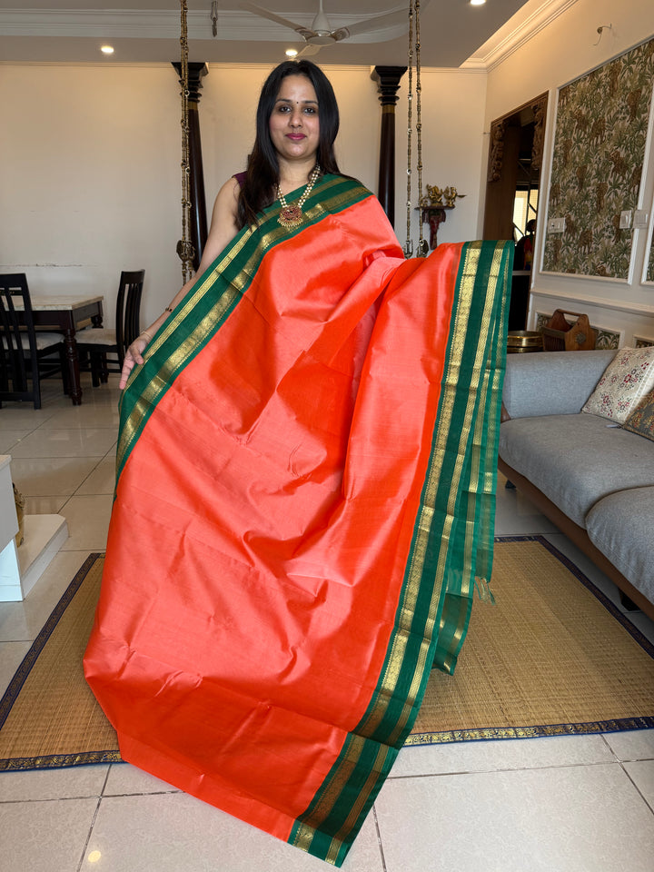 Kanakambaram with Green , traditional Kanchi borders  and rich Pallu  Korvai Silk Cotton Saree