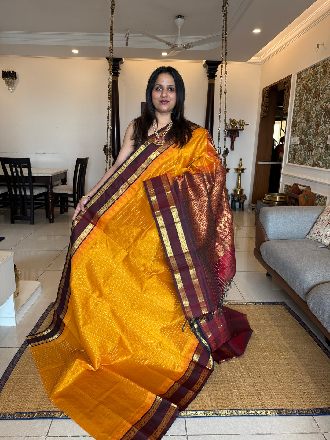Manjal with Dark Maroon , traditional rettapet border , Zari kattam in the body with Zari butta , rich Pallu  Korvai Silk Cotton Saree