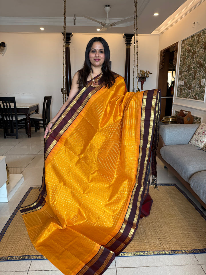 Manjal with Dark Maroon , traditional rettapet border , Zari kattam in the body with Zari butta , rich Pallu  Korvai Silk Cotton Saree