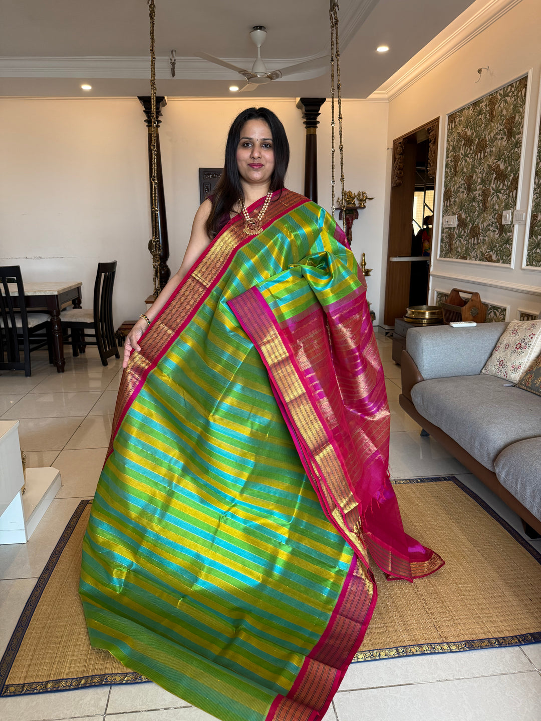 A Fusion of colours Yellow ,Turquoise Blue , Green with Magenta  , traditional borders and rich Pallu Korvai Silk Cotton Saree