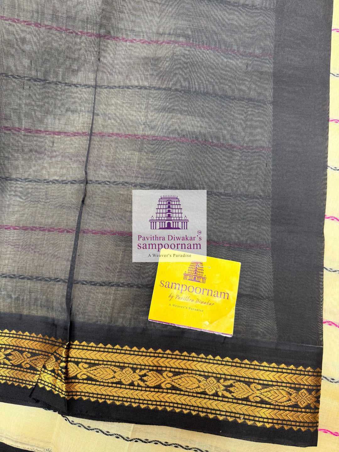 Offwhite with Black , traditional borders with Veldhari lines in the body and grand Pallu Korvai Silk Cotton Saree