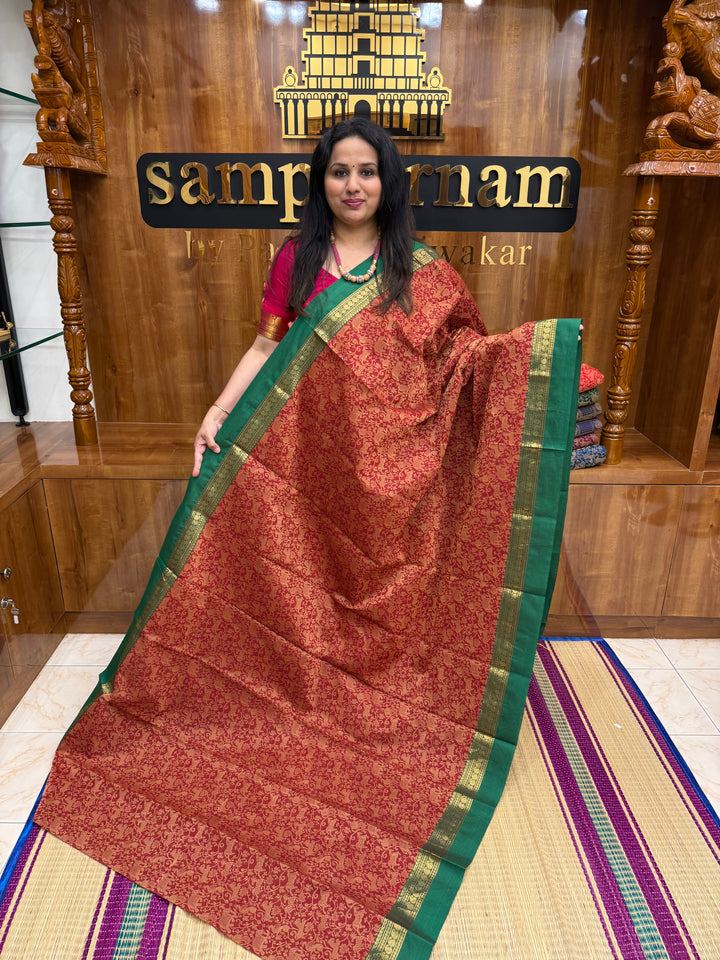 Brick Red with Green , Rich Vanasingaram thread motif in the body , Traditional borders and Plain Pallu Chettinad Cottton Saree