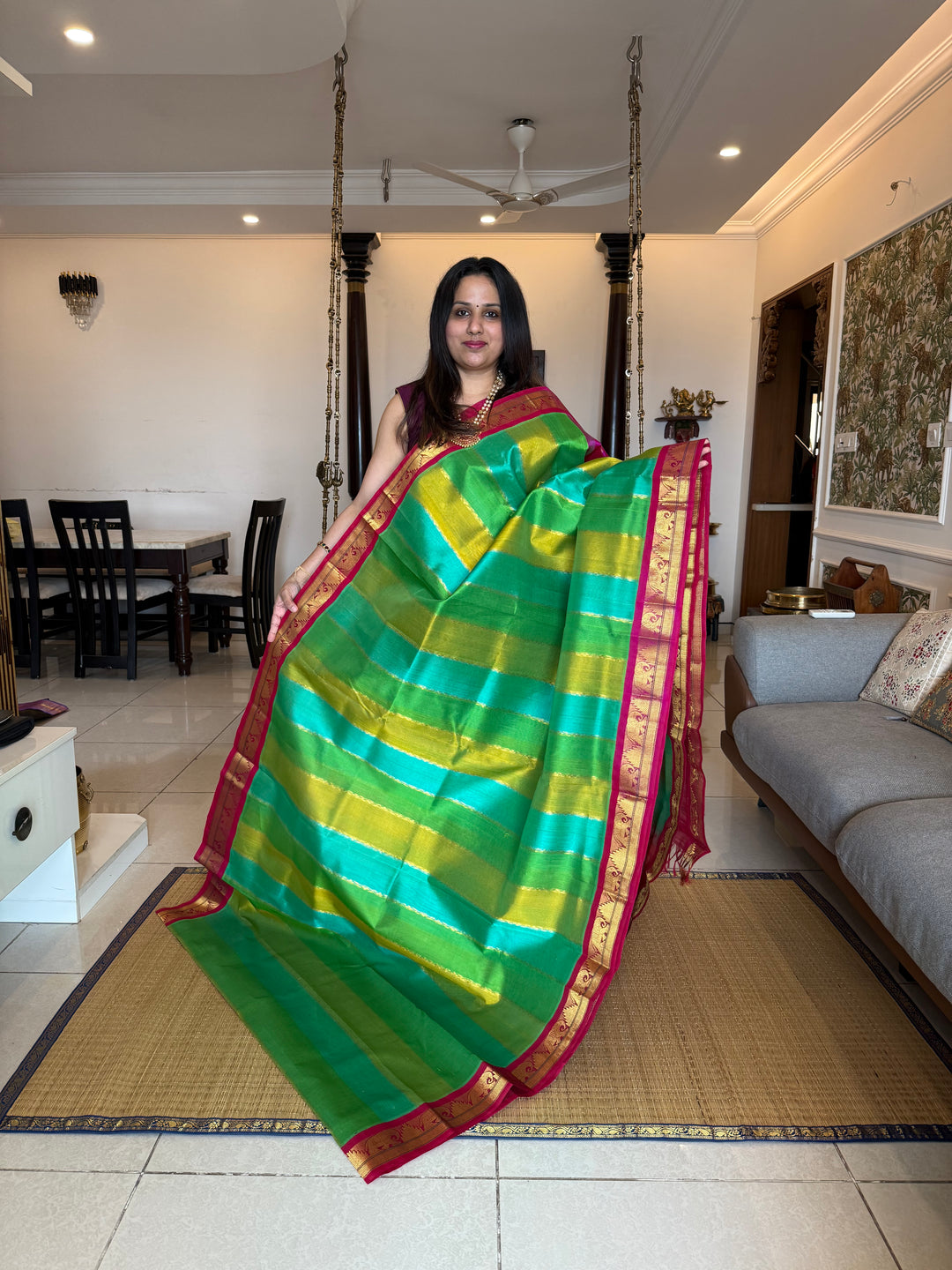 A Fusion of colours shades of Green and Blue with Magenta  , traditional borders and rich Pallu Korvai Silk Cotton Saree