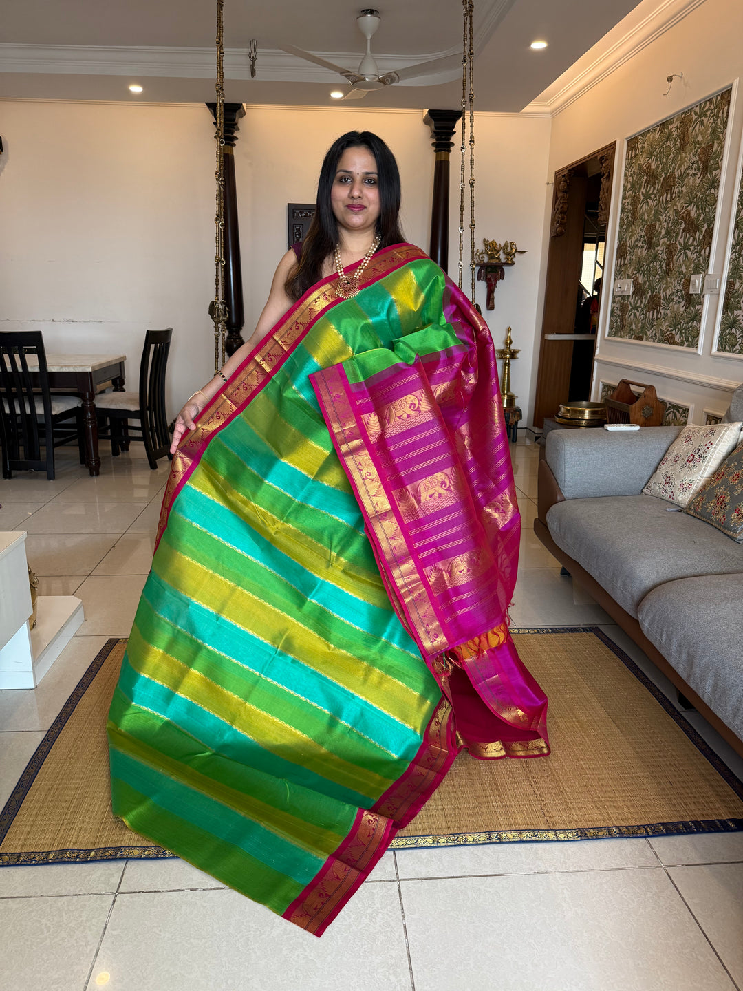 A Fusion of colours shades of Green and Blue with Magenta  , traditional borders and rich Pallu Korvai Silk Cotton Saree
