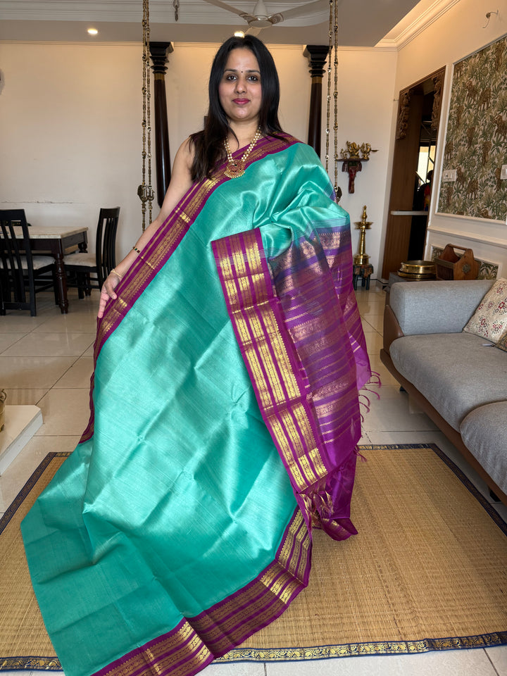 Teal with Purple one side big , Kanchi borders  and rich Pallu  Korvai Silk Cotton Saree