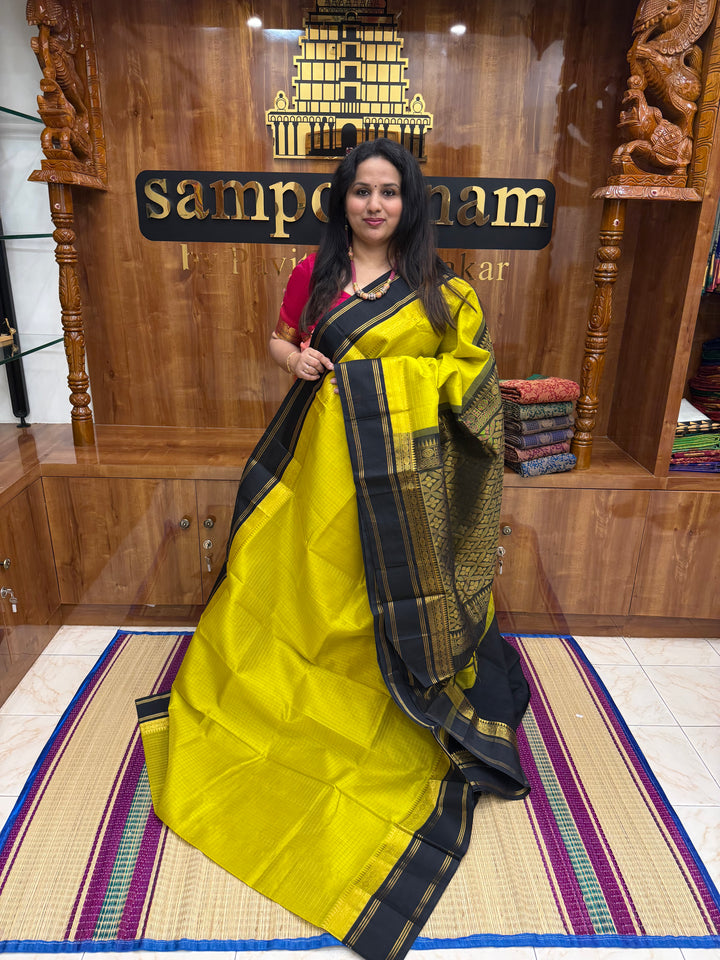 Lemon Yellow with Black , Rich Zari checks in the body , rettapet borders and rich Pallu Korvai Silk Cotton Saree