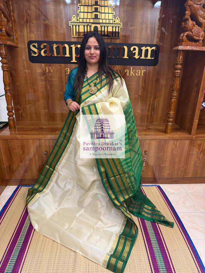 Offwhite with Green , Temple design with rettapet borders and rich Pallu Korvai Silk Cotton Saree