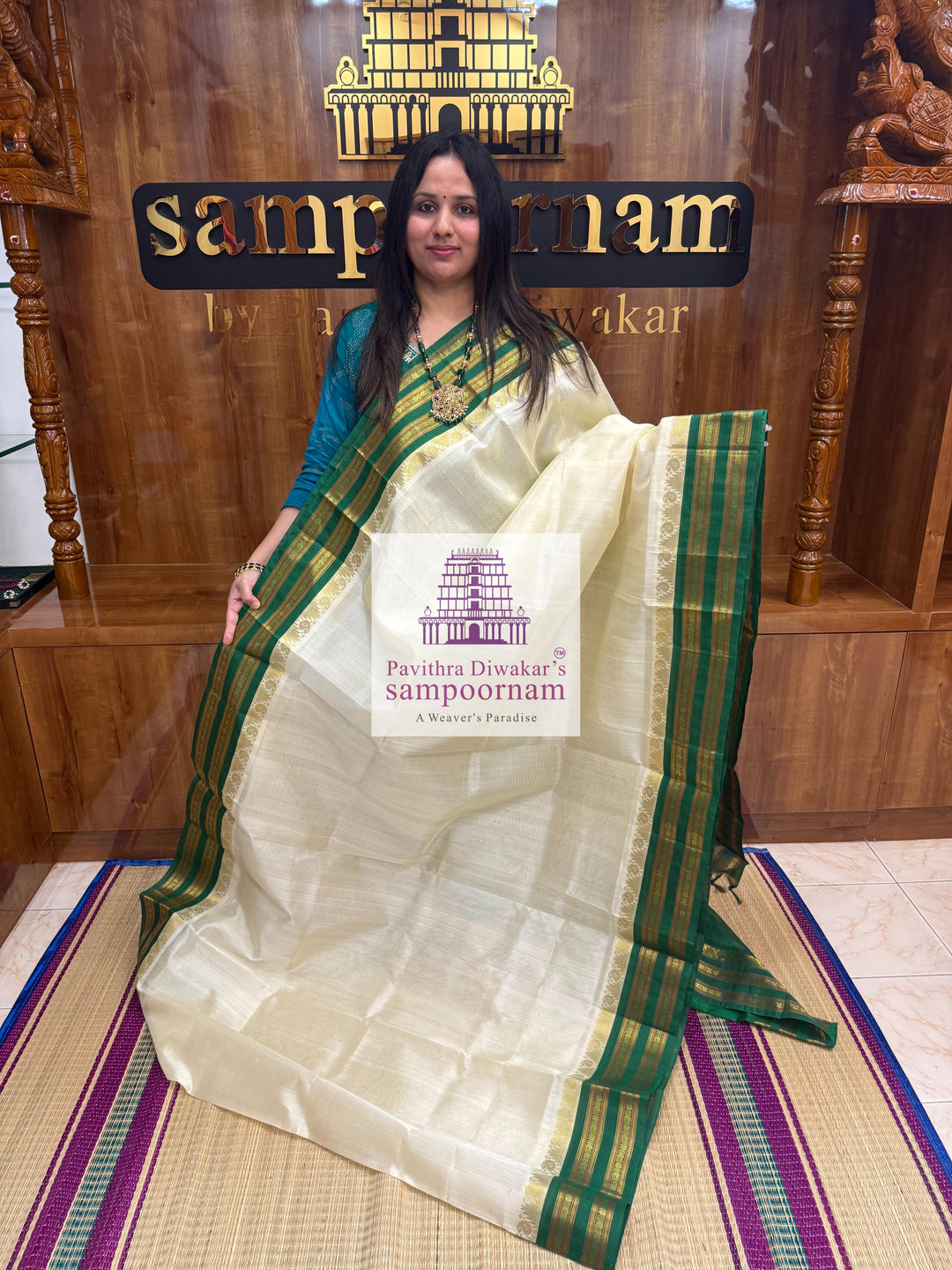 Offwhite with Green , Temple design with rettapet borders and rich Pallu Korvai Silk Cotton Saree