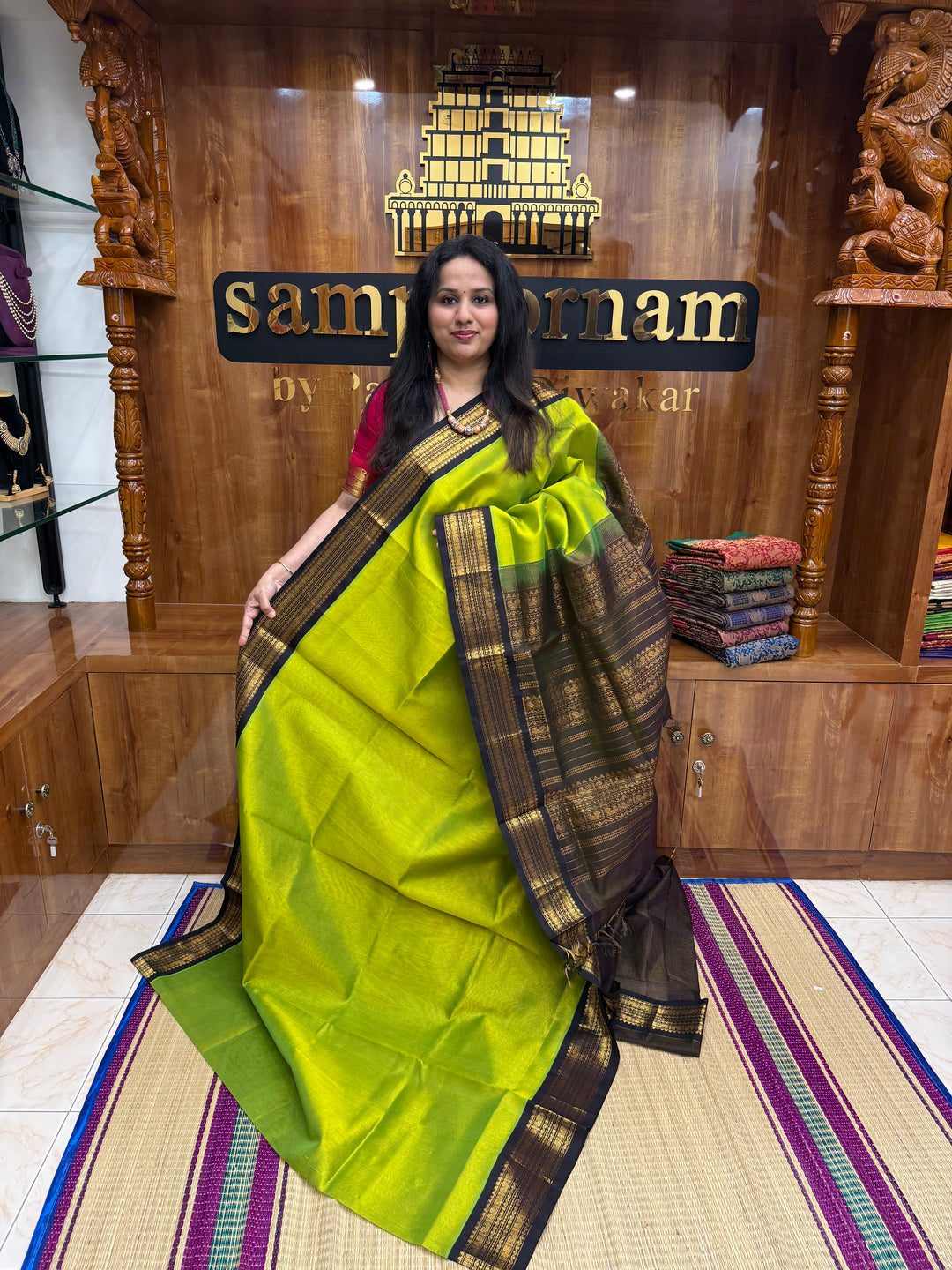 Sneha Green with Black , Vairaoosi Zari lines in the body ,  Traditional  borders and rich Pallu Korvai Silk Cotton Saree