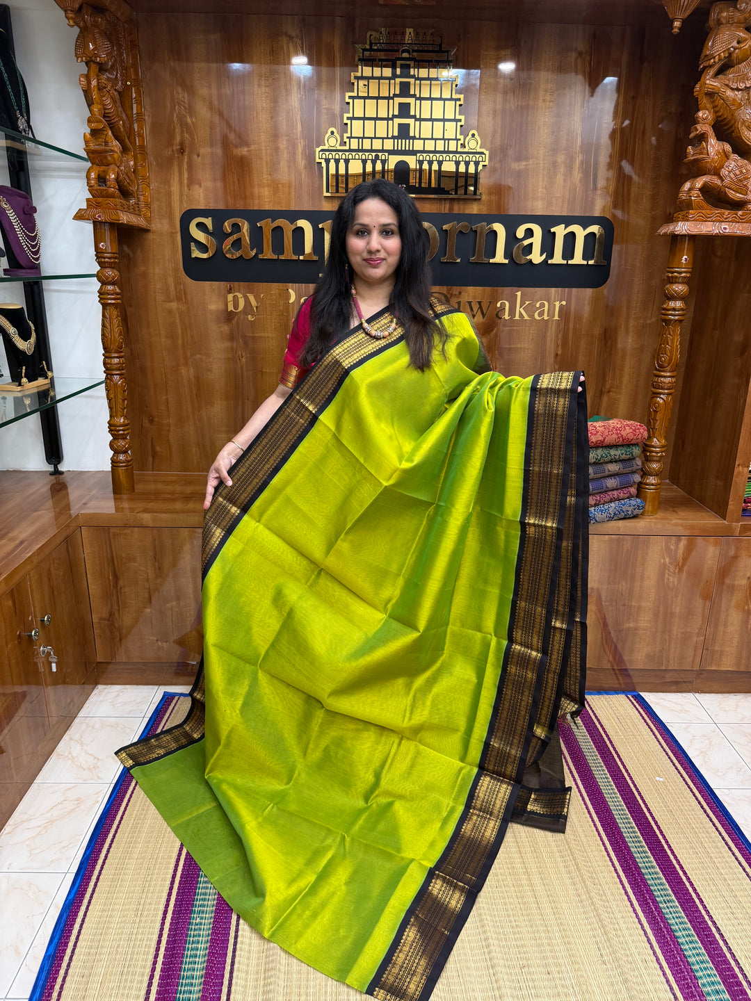 Sneha Green with Black , Vairaoosi Zari lines in the body ,  Traditional  borders and rich Pallu Korvai Silk Cotton Saree