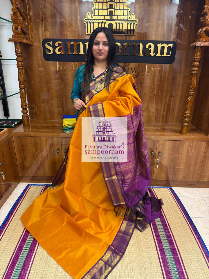 Manjal with Purple , rettapet borders and grand Pallu Korvai Silk Cotton Saree.