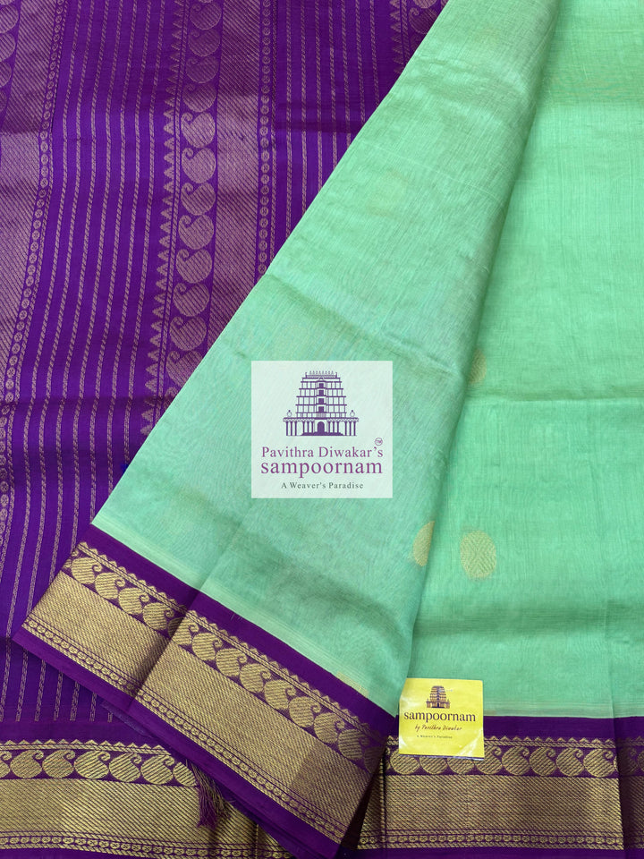 Pastel Green with Purple , Zari butta in the body , traditional border and rich Pallu Korvai Silk Cotton Saree