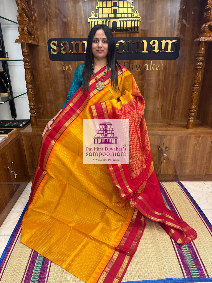 Mambazha Manjal with Red Zari checks in the body , temple rettapet border and grand Pallu Korvai Silk Cotton Saree