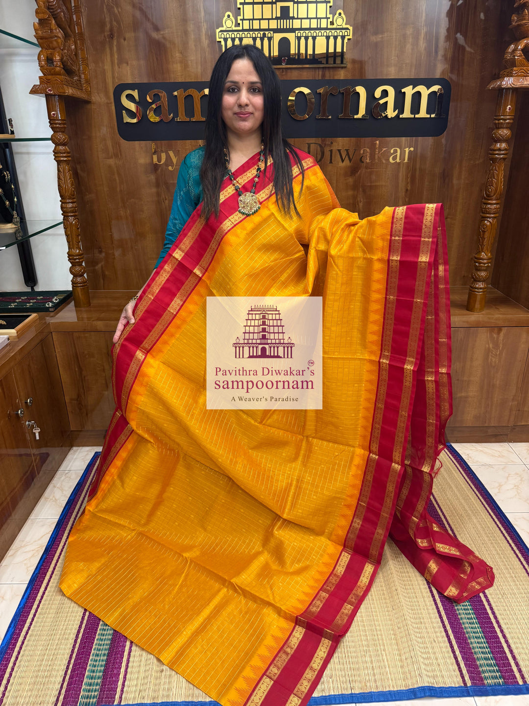 Mambazha Manjal with Red Zari checks in the body , temple rettapet border and grand Pallu Korvai Silk Cotton Saree