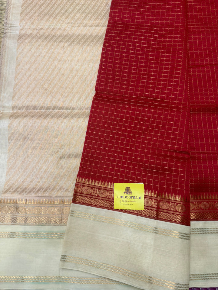 Classic Red with Offwhite , Rich Zari checks in the body , rettapet borders and rich Pallu Korvai Silk Cotton Saree