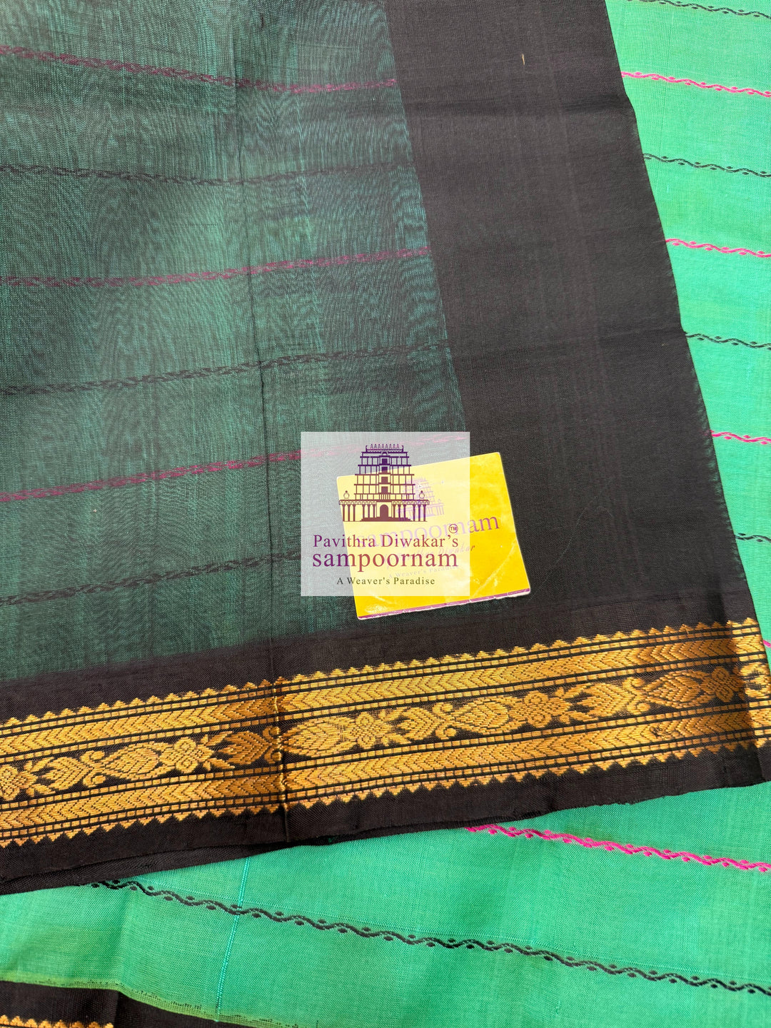 Ramar Green with Black  , traditional borders with Veldhari lines in the body and grand Pallu Korvai Silk Cotton Saree