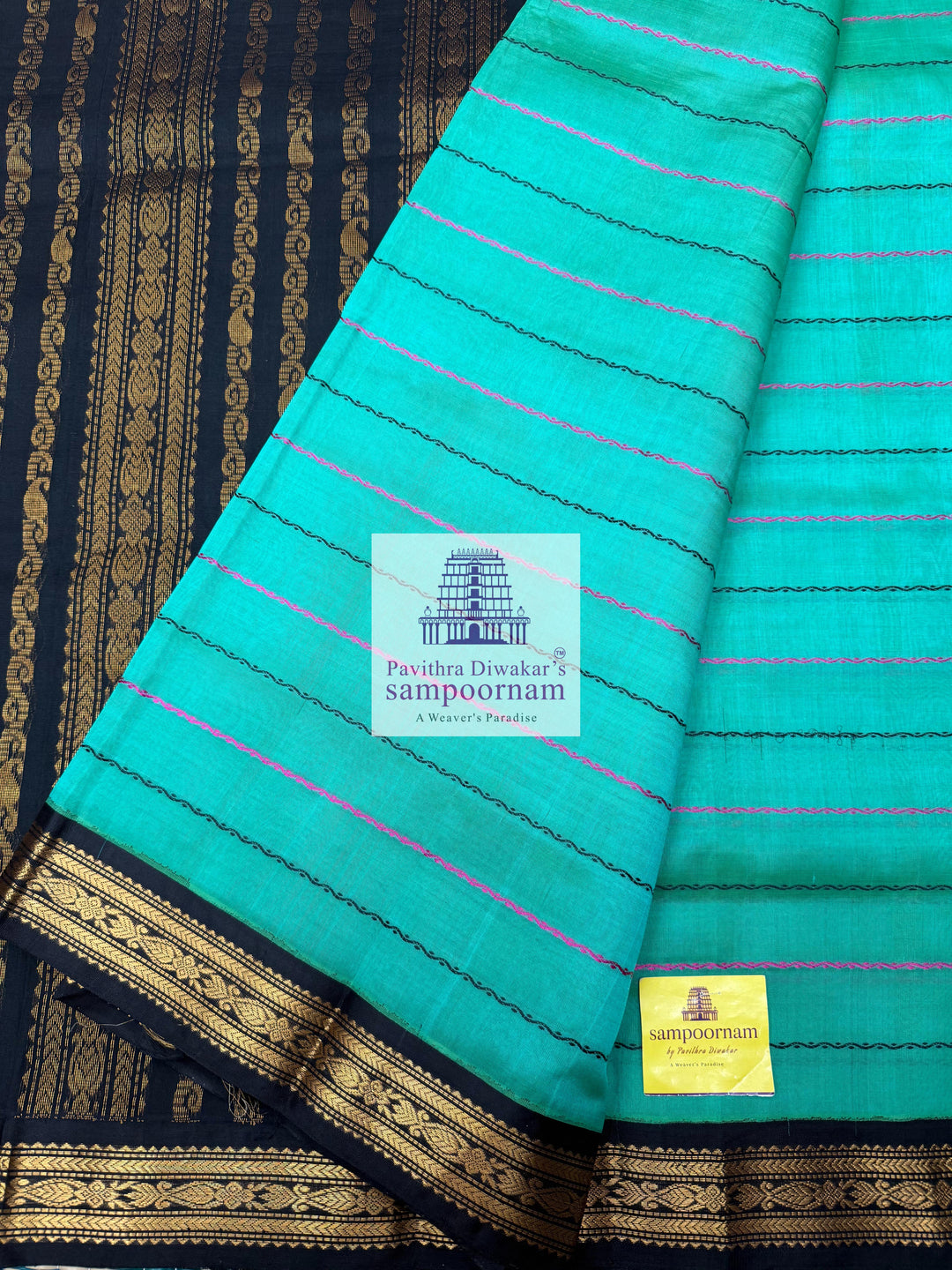 Ramar Green with Black  , traditional borders with Veldhari lines in the body and grand Pallu Korvai Silk Cotton Saree