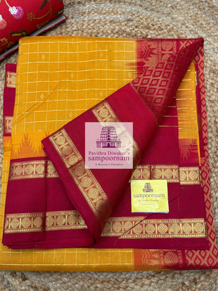Mambazha Manjal with Red Zari checks in the body , temple rettapet border and grand Pallu Korvai Silk Cotton Saree