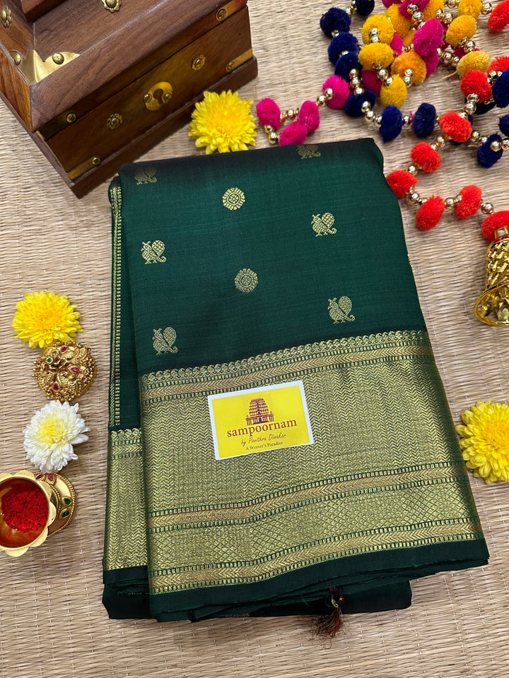 Dark Green with Zari Butta all over the Body Rich Border And Pallu Pure Kanjivaram Silk Saree