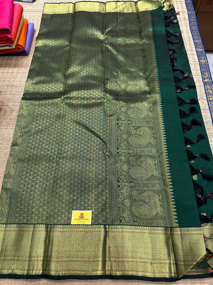 Dark Green with Zari Butta all over the Body Rich Border And Pallu Pure Kanjivaram Silk Saree