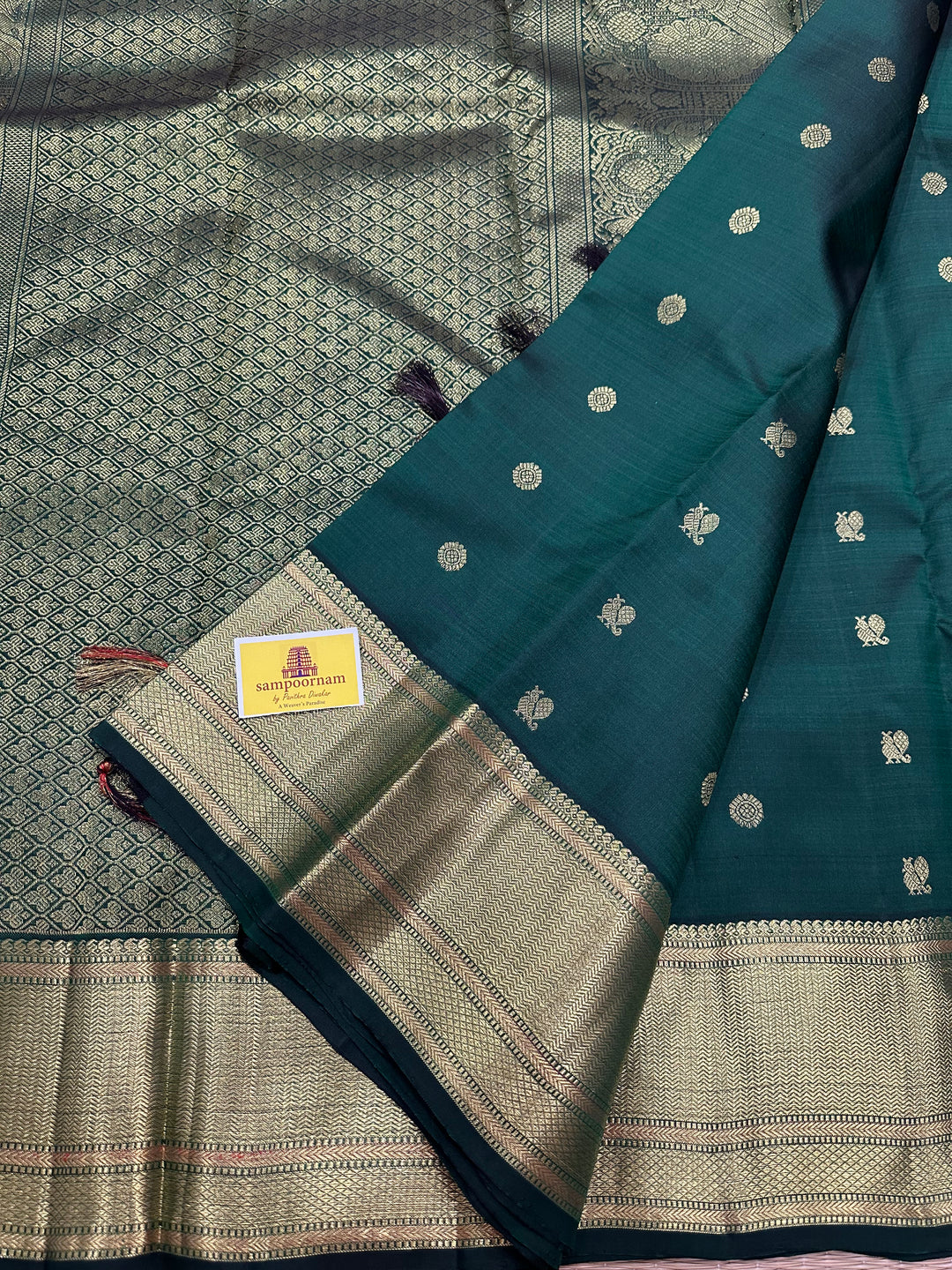 Dark Green with Zari Butta all over the Body Rich Border And Pallu Pure Kanjivaram Silk Saree