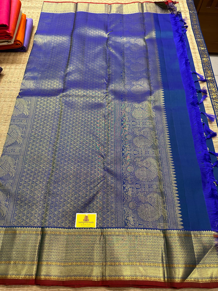 Mayil Kazhuthu Blue with Annam And Rudraksh Butta Rich Border and Pallu Pure Kanjivaram Silk Saree