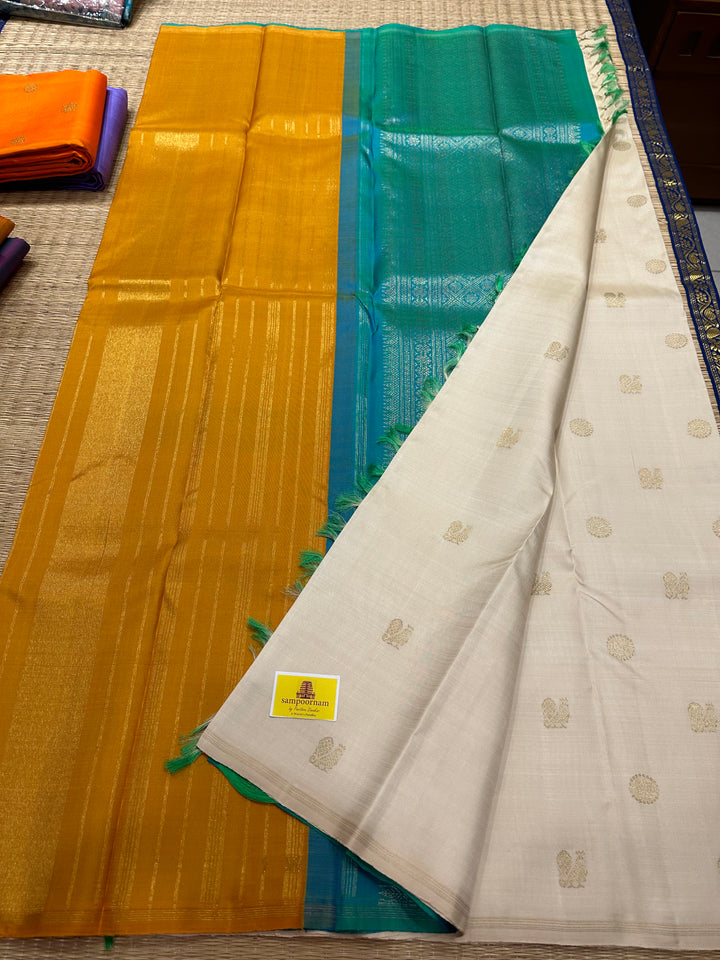 Offwhite with Double Coloured Border Mustard and Sea Green , Rich Annam and Rudraksh Zari Butta, Rich pallu ,Kanjivaram Pure Zari Silk Saree