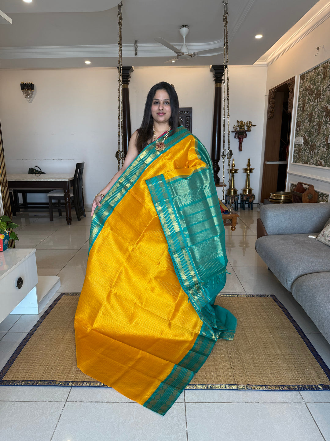Yellow with Turquoise Blue , rettapet traditional border , Zari checks in the body and rich Pallu Korvai Silk Cotton Saree