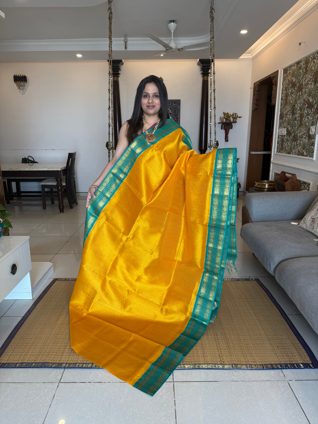 Yellow with Turquoise Blue , rettapet traditional border , Zari checks in the body and rich Pallu Korvai Silk Cotton Saree