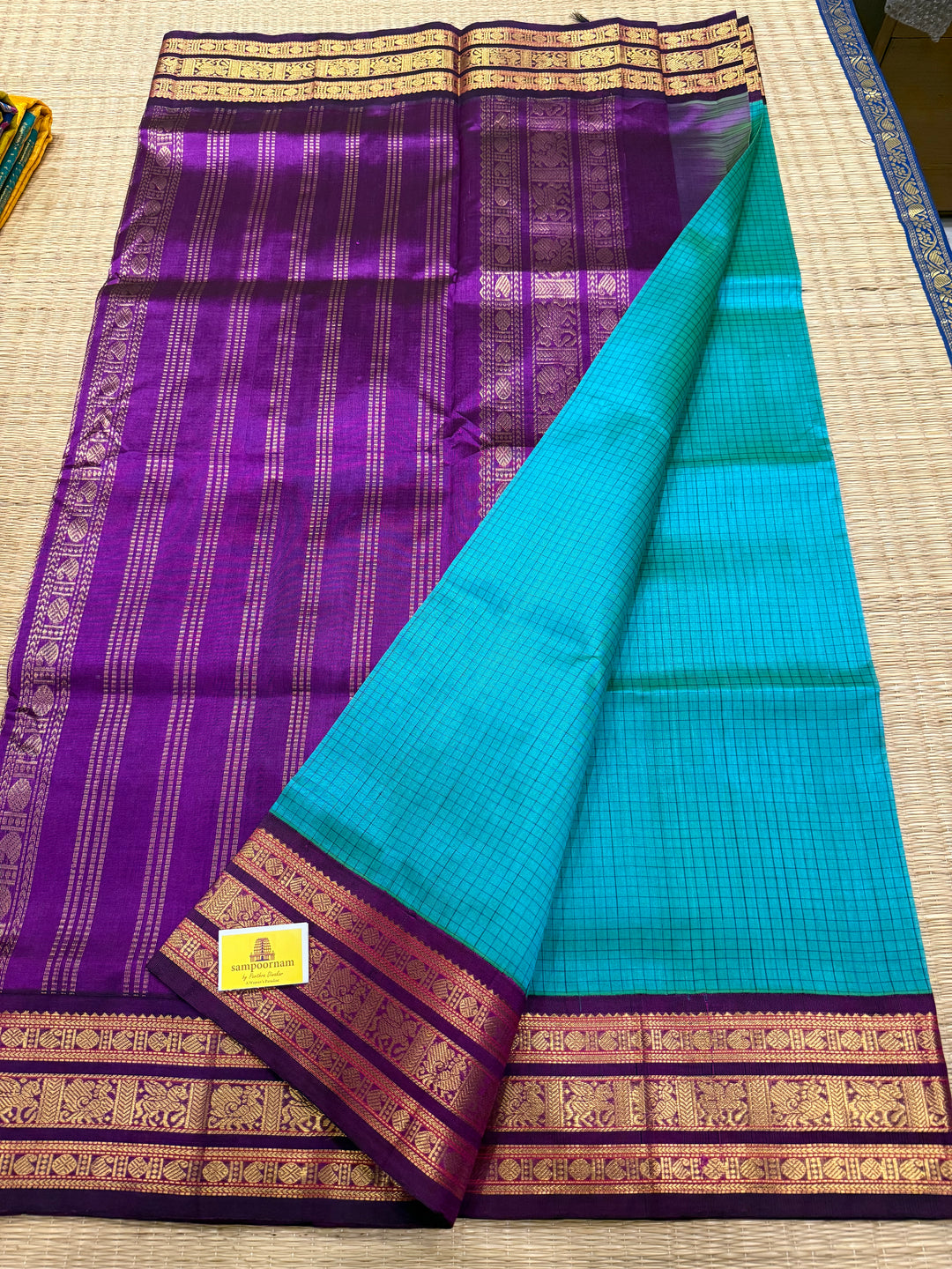 Ramar Blue with Purple , Zari checks in the body with traditional Kanjivaram borders and rich Pallu Korvai Silk Cotton Saree