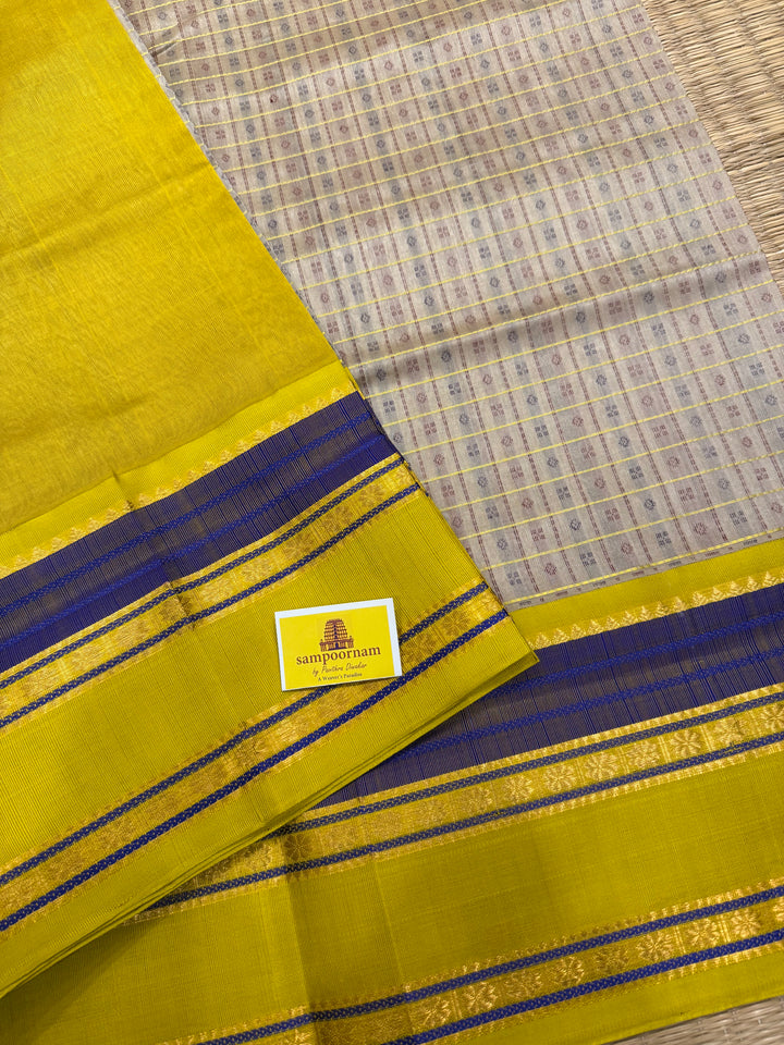 Offwhite with Lemon Yellow , Lakshadeepam Zari butta in the body and rettapet traditional borders and rich Pallu Korvai Silk Cotton Saree