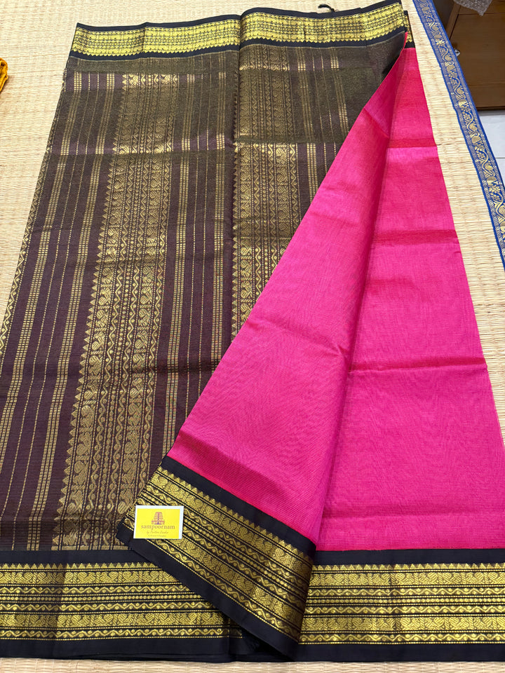 Magenta with Black Vairaoosi Zari lines in the body traditional borders and rich Pallu Korvai Silk Cotton Saree