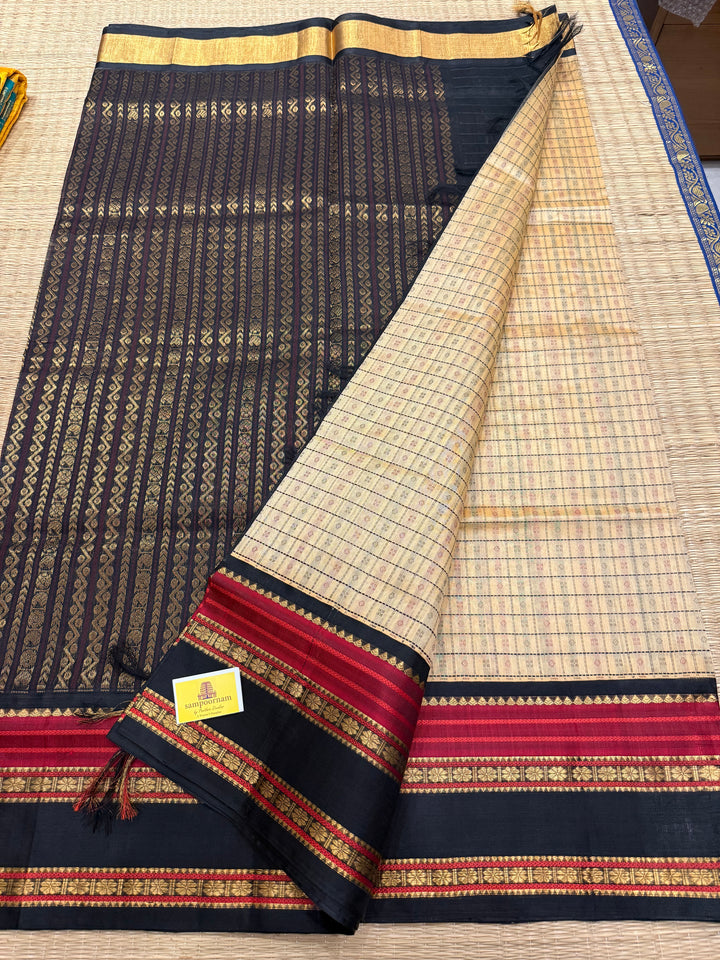 Biscuit and Black , Lakshadeepam Zari butta in the body and rettapet traditional borders and rich Pallu Korvai Silk Cotton Saree