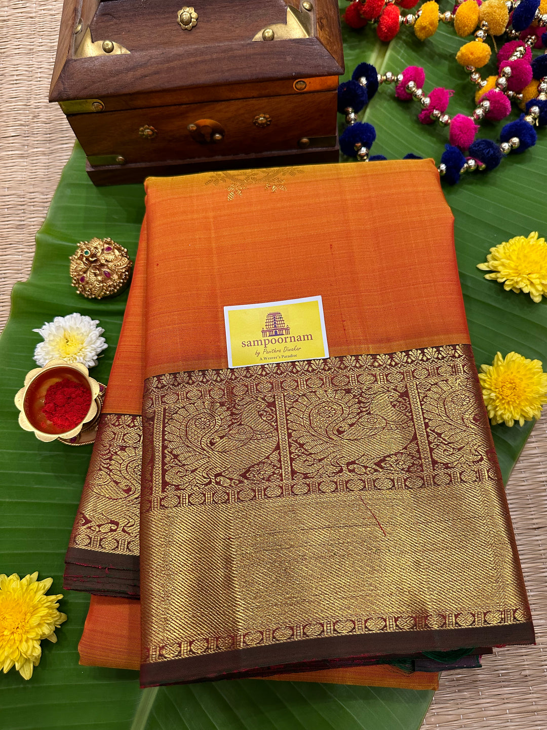 Orange with Greenish Purple Rich Zari Butta , Rich Border and Pallu Pure Kanjivaram Silk Saree