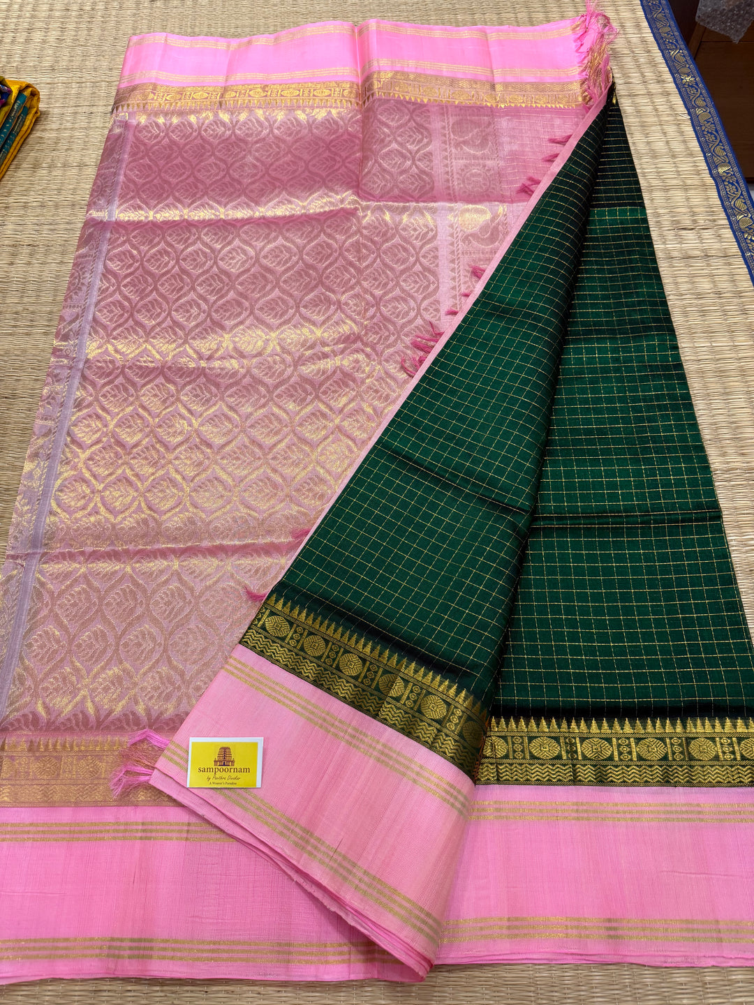 Green with Baby Pink rich Zari checks in the body, traditional rettapet plain border and grand Pallu Korvai Silk Cotton Saree