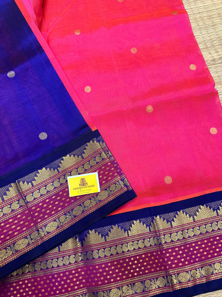 Magenta with Blue , rettapet border with Lakshadeepam butta , rich butta in the body and grand Pallu Korvai Silk Cotton Saree