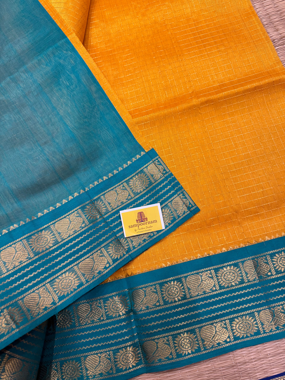 Yellow with Turquoise Blue , rettapet traditional border , Zari checks in the body and rich Pallu Korvai Silk Cotton Saree