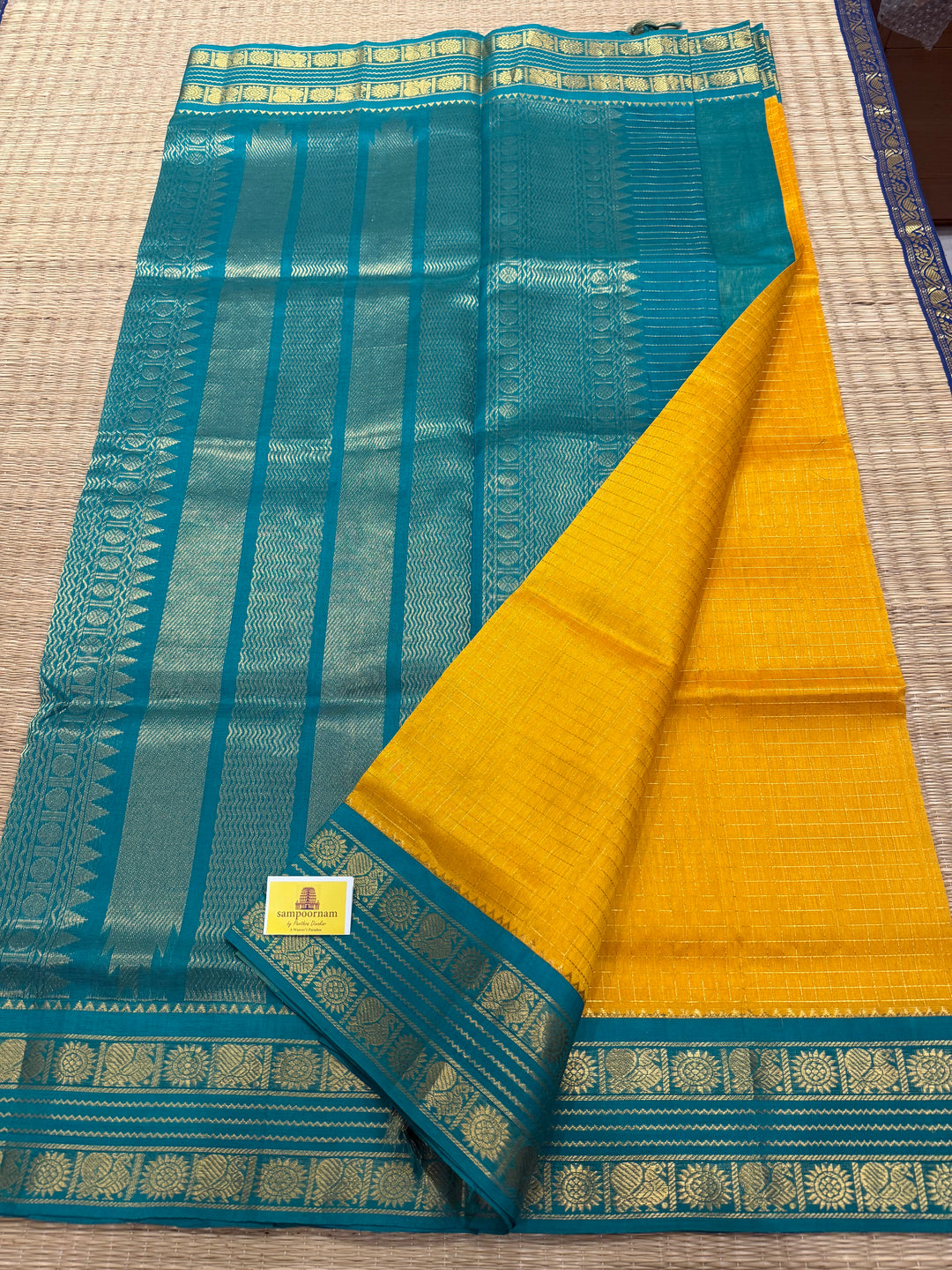 Yellow with Turquoise Blue , rettapet traditional border , Zari checks in the body and rich Pallu Korvai Silk Cotton Saree