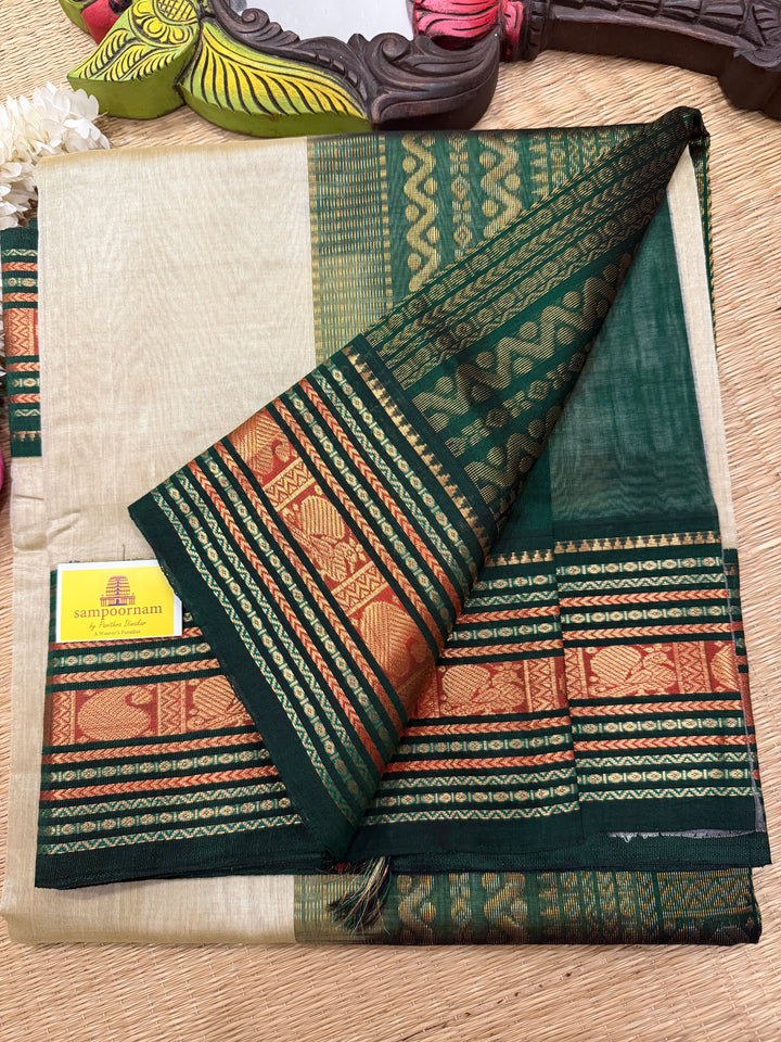 Offwhite with Green rich Kanchi border and grand  Pallu Korvai Silk Cotton Saree