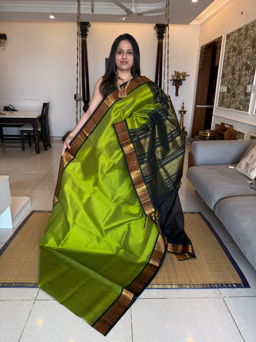 Leaf Green with Black , checks in the body , traditional borders and rich Pallu Korvai Silk Cotton Saree