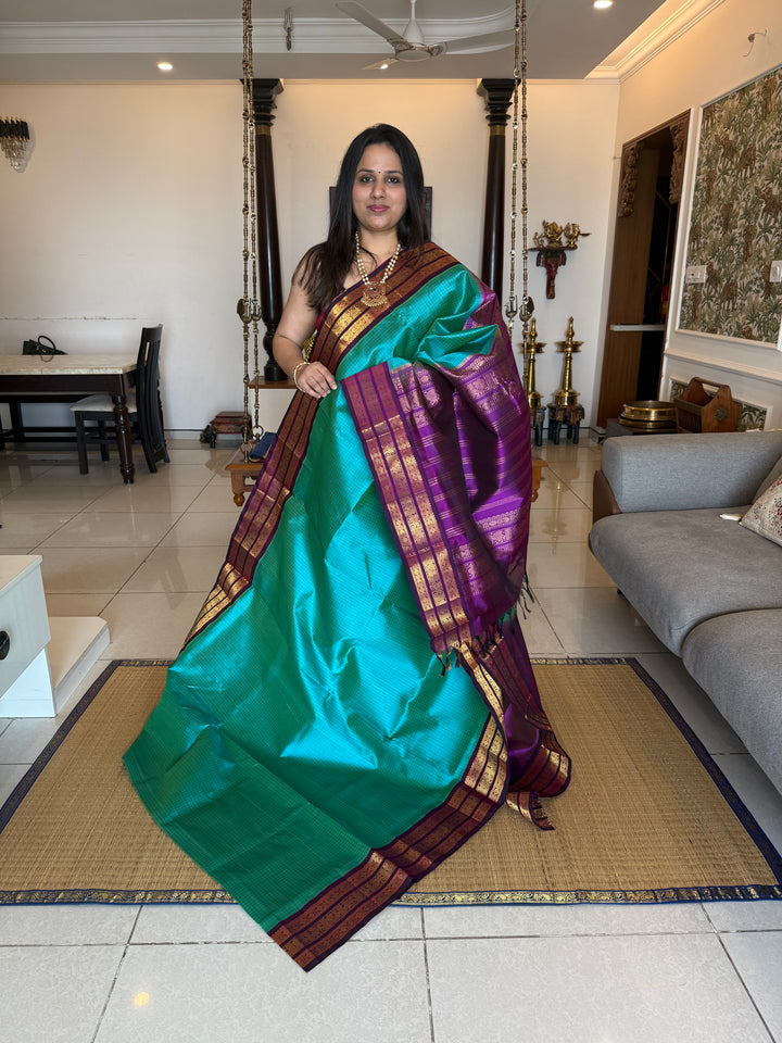 Ramar Blue with Purple , Zari checks in the body with traditional Kanjivaram borders and rich Pallu Korvai Silk Cotton Saree