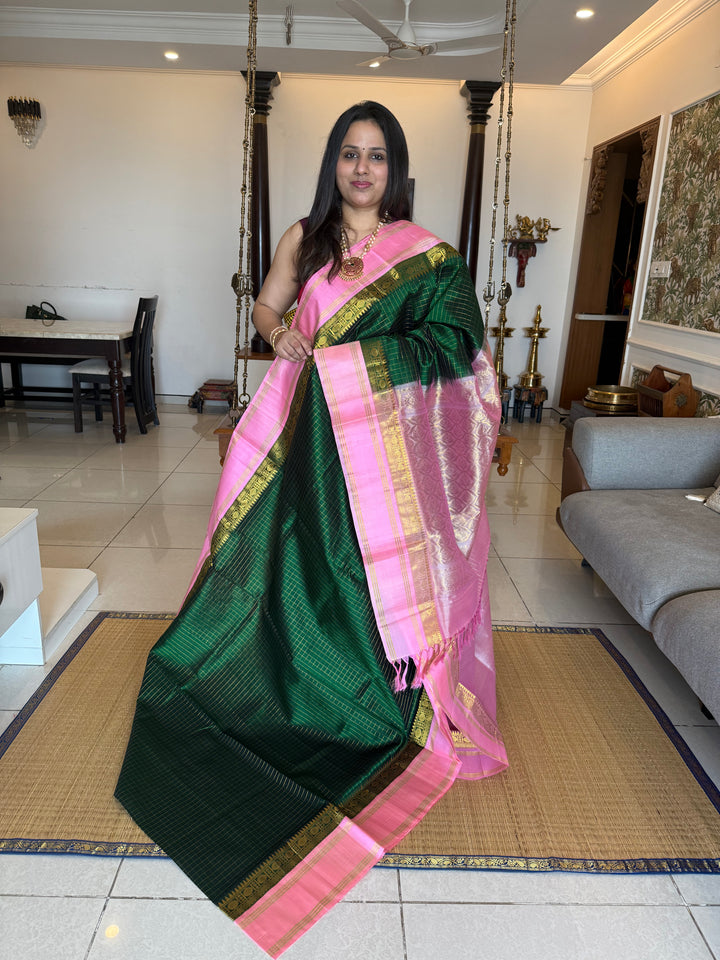 Green with Baby Pink rich Zari checks in the body, traditional rettapet plain border and grand Pallu Korvai Silk Cotton Saree