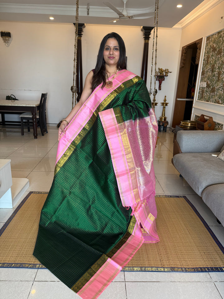 Green with Baby Pink rich Zari checks in the body, traditional rettapet plain border and grand Pallu Korvai Silk Cotton Saree