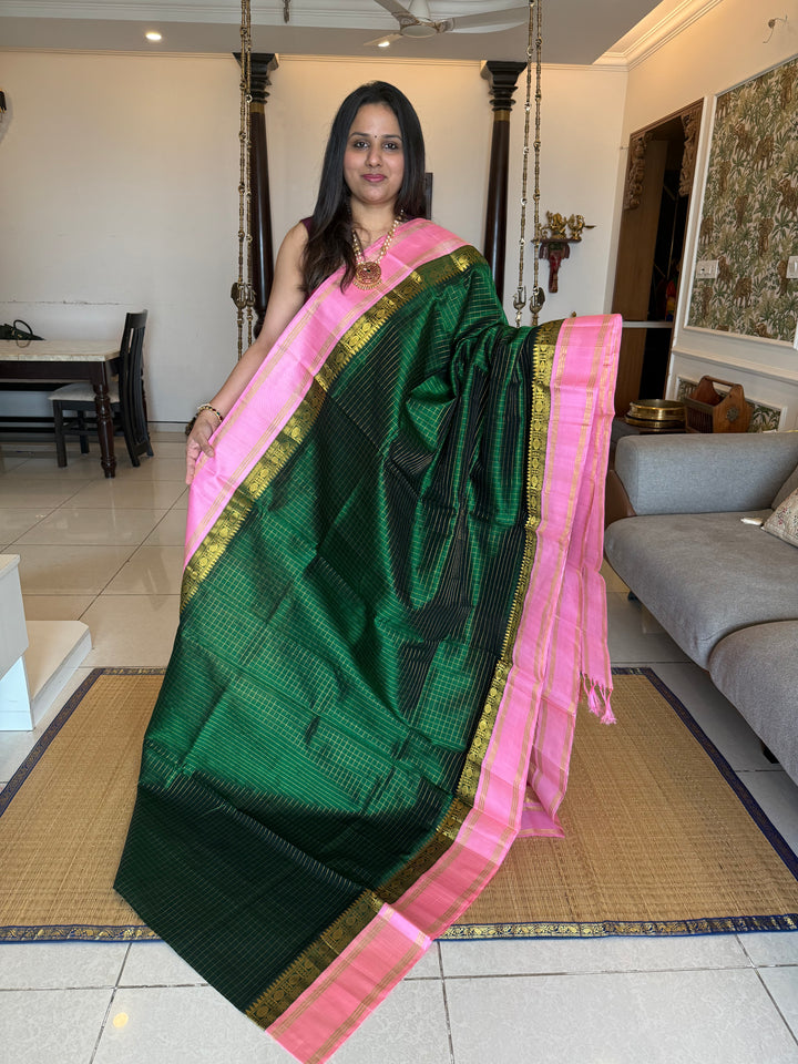 Green with Baby Pink rich Zari checks in the body, traditional rettapet plain border and grand Pallu Korvai Silk Cotton Saree