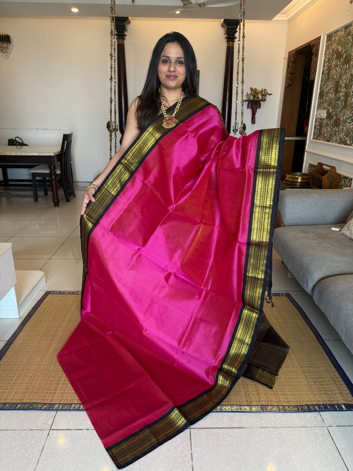 Magenta with Black Vairaoosi Zari lines in the body traditional borders and rich Pallu Korvai Silk Cotton Saree